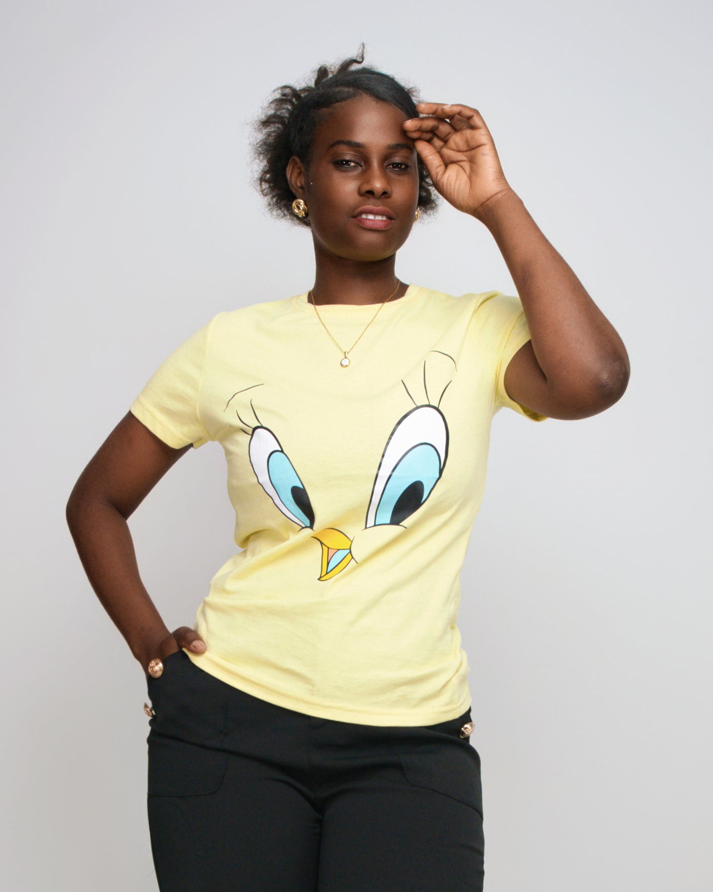 T-SHIRT FEMENINA COM MODELO OLHOS DO PATINHO (KK35053)