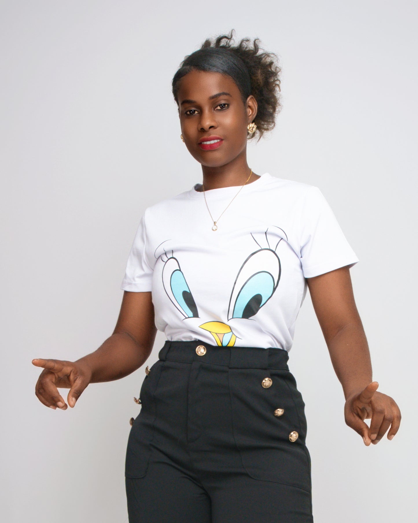 T-SHIRT FEMENINA COM MODELO OLHOS DO PATINHO (KK35053)