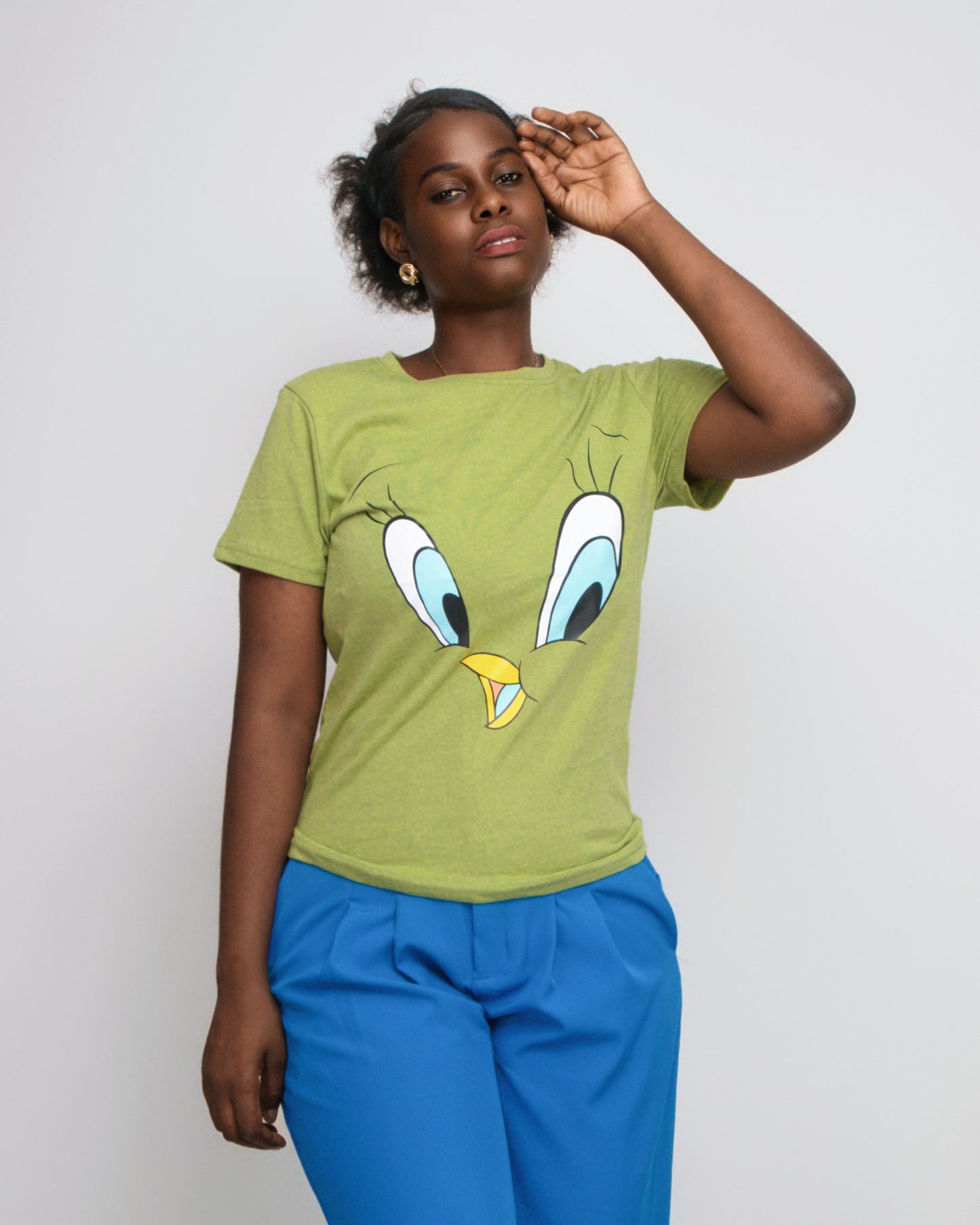 T-SHIRT FEMENINA COM MODELO OLHOS DO PATINHO (KK35053)